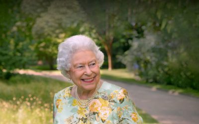 Portrait of HM The Queen, with parkland behind